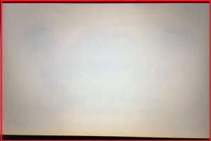 How should I clean these faint yellow spots on my display?