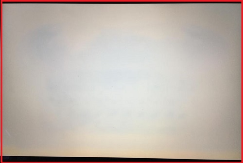 How should I clean these faint yellow spots on my display?